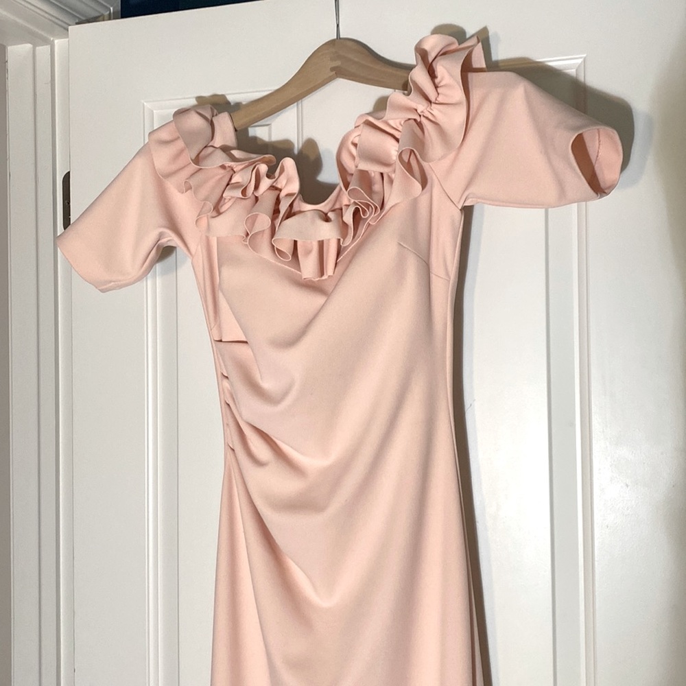 Evening gown was a big hit when I wore it! Like brand new barely worn. Spotless
